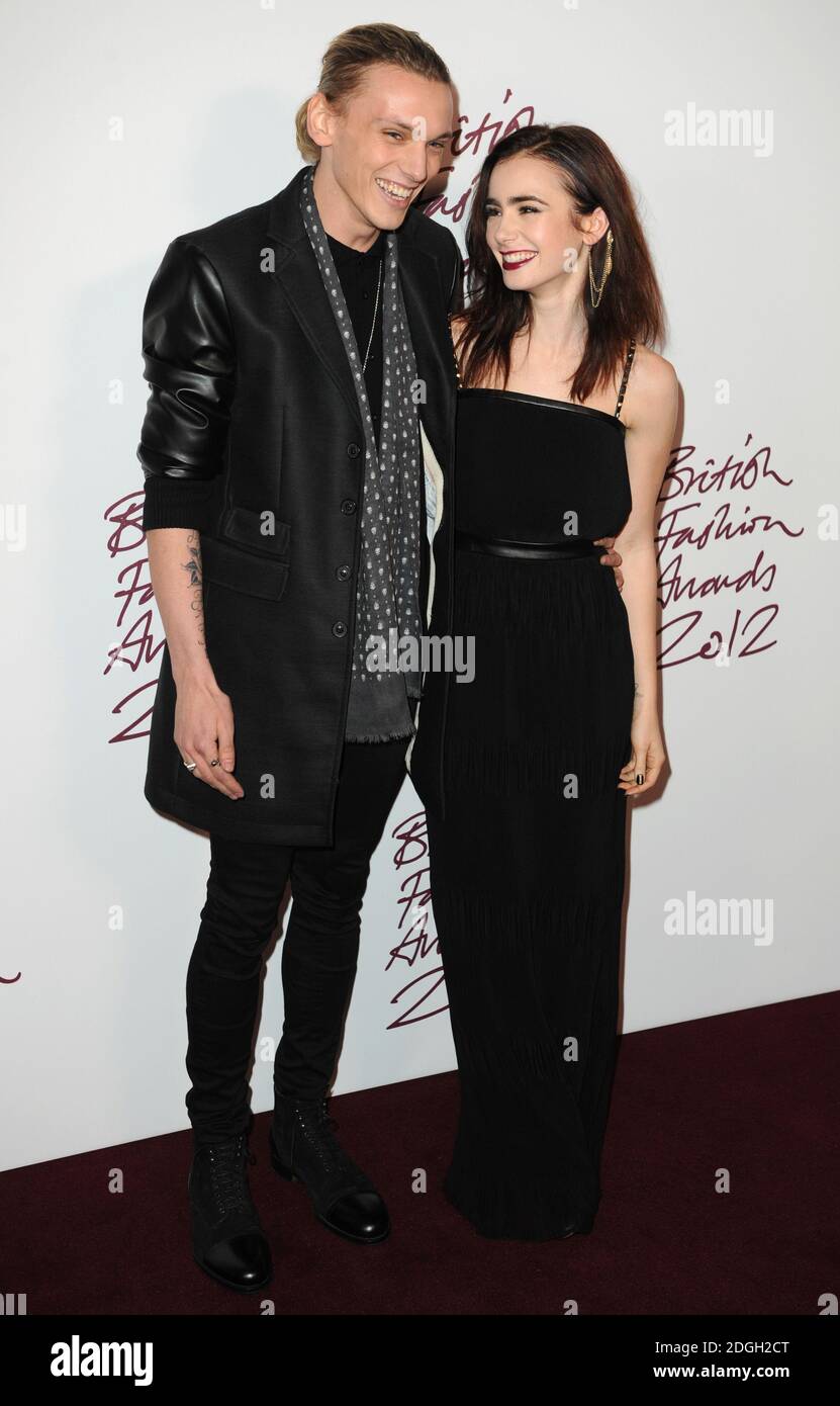 Jamie Campbell Bower and Lily Collins arriving at the British Fashion  Awards 2012, The Savoy Hotel, London Stock Photo - Alamy, image size:831x1390