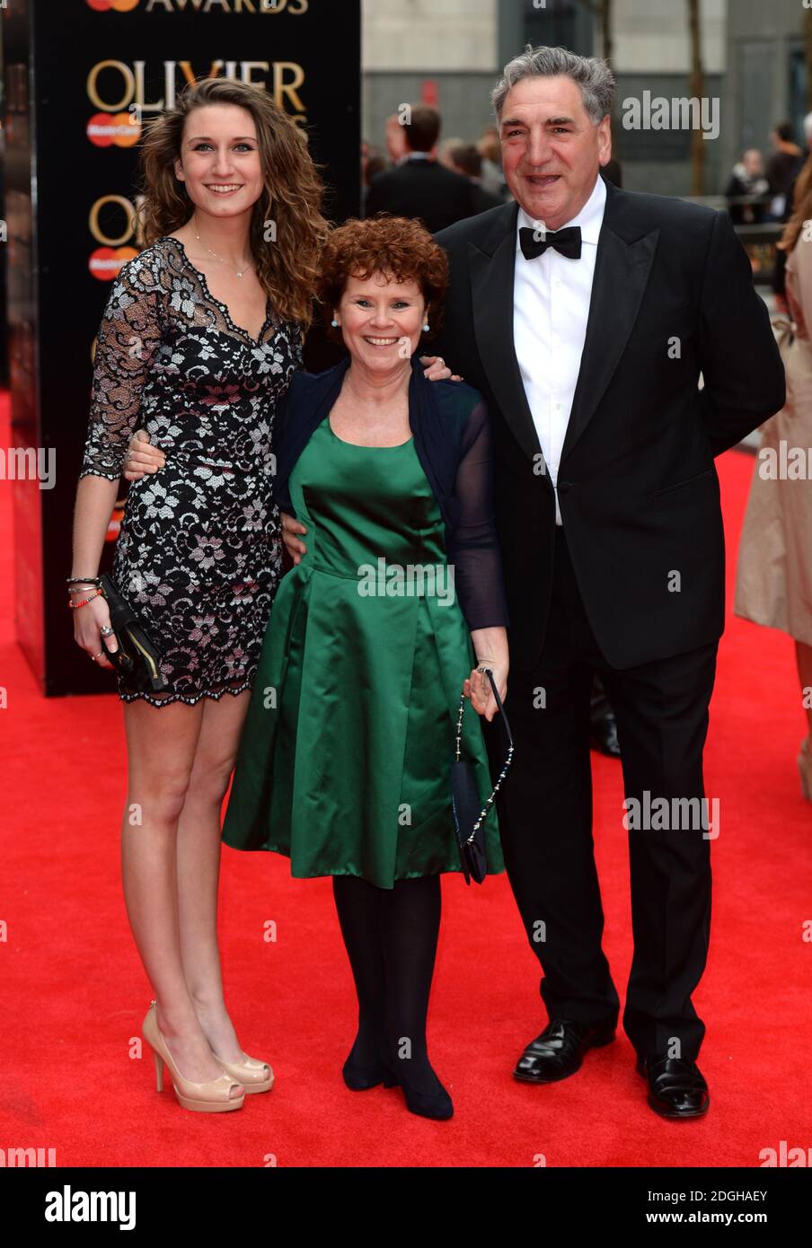 Imelda Staunton, Jim Carter and daughter arriving at the Olivier Awards 2013, Royal Opera House, Covent Garden, London. Stock Photo