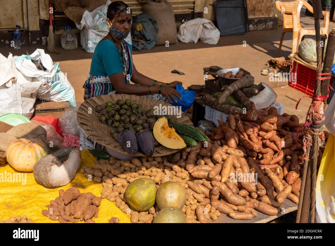 Goa India 11 November 2020 Goan Woman selling fresh vegetables in the street of Mapusa Market Goa city Stock Photo