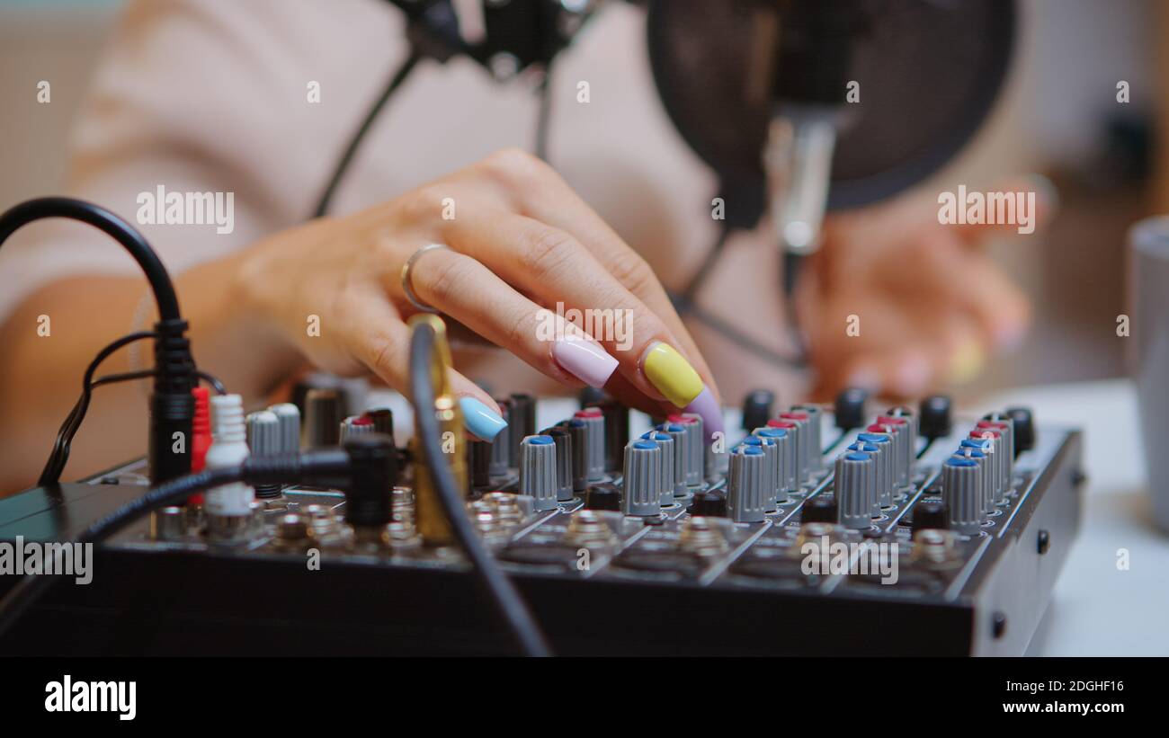 Content creator checking sound on dj mixer for better podcast. Creative  online show presenter, On-air online production internet broadcast show  host streaming live content, recording digital media Stock Photo - Alamy