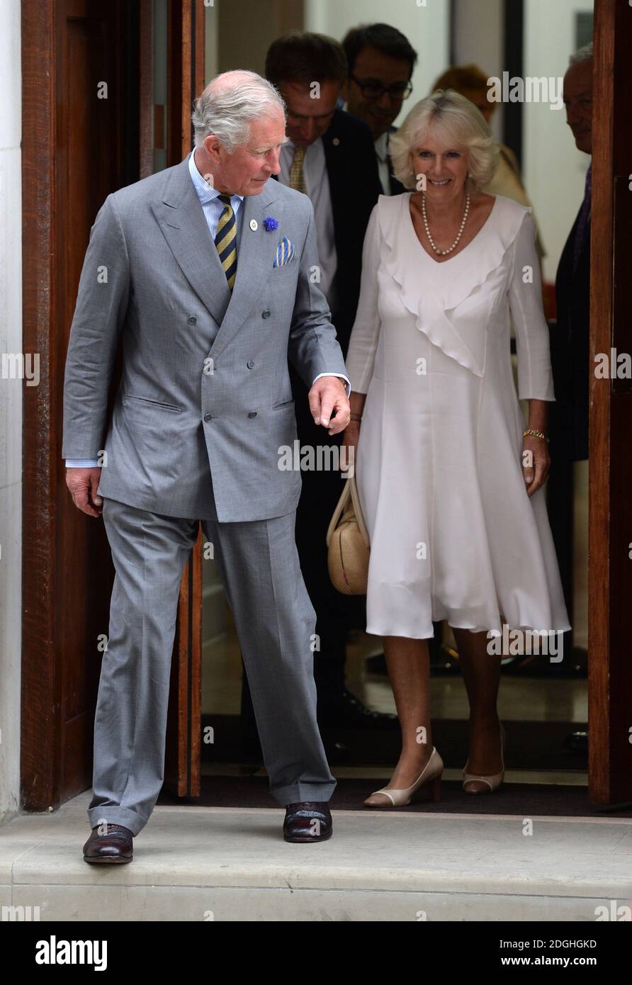 Prince Charles, The Duke of Cornwall and Camilla Parker Bowles, The Duchess of Cornwall visiting Prince William and Kate Middleton, The Duke and Duchess of Cambridge at the Lindo Wing of St Mary's Hospital with their new born baby boy, Paddington, London.   Stock Photo