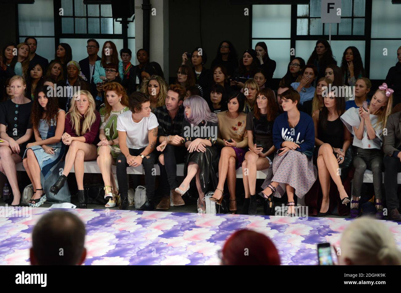 (Left to Right) Eliza Doolittle, Ellie Goulding, Nicola Roberts, Harry Styles, Nick Grimshaw, Kelly Osbourne, Leigh Lezark, Alexa Chung, Pixie Geldof and Daisy Lowe at the House of Holland Catwalk Show Catwalk Show, part of London Fashion Week, Spring Summer 2014, Goldsmiths Hall.   Stock Photo