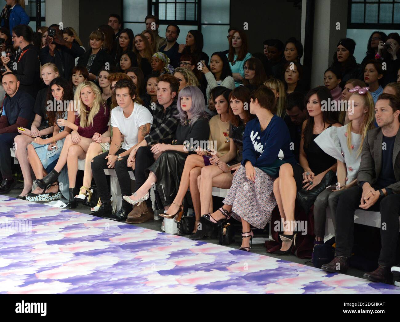 (Left to Right) Eliza Doolittle, Ellie Goulding, Nicola Roberts, Harry Styles, Nick Grimshaw, Kelly Osbourne, Leigh Lezark, Alexa Chung, Pixie Geldof and Daisy Lowe at the House of Holland Catwalk Show Catwalk Show, part of London Fashion Week, Spring Summer 2014, Goldsmiths Hall.  Stock Photo