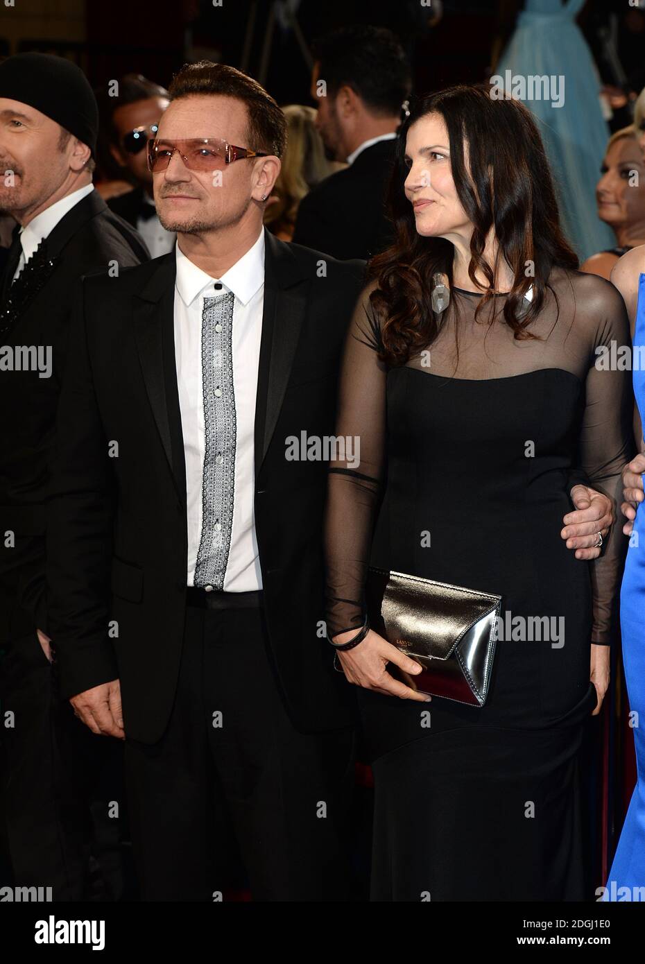 Bono and Ali Hewson arriving at the 86th Academy Awards held at the Dolby Theatre in Hollywood, Los Angeles, CA, USA, March 2, 2014. Stock Photo