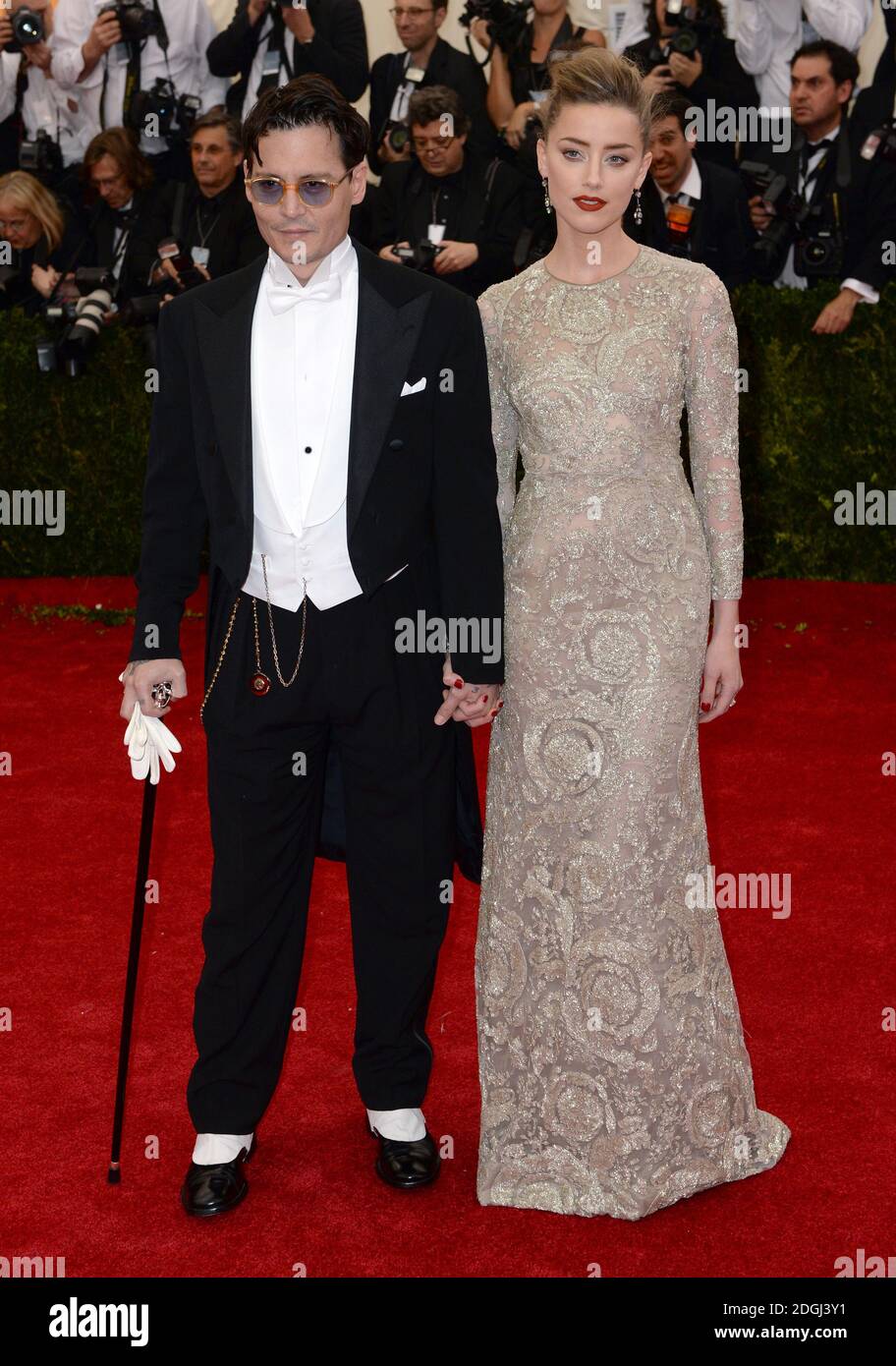 Johnny Depp and Amber Heard arriving at the Costume Institute Benefit