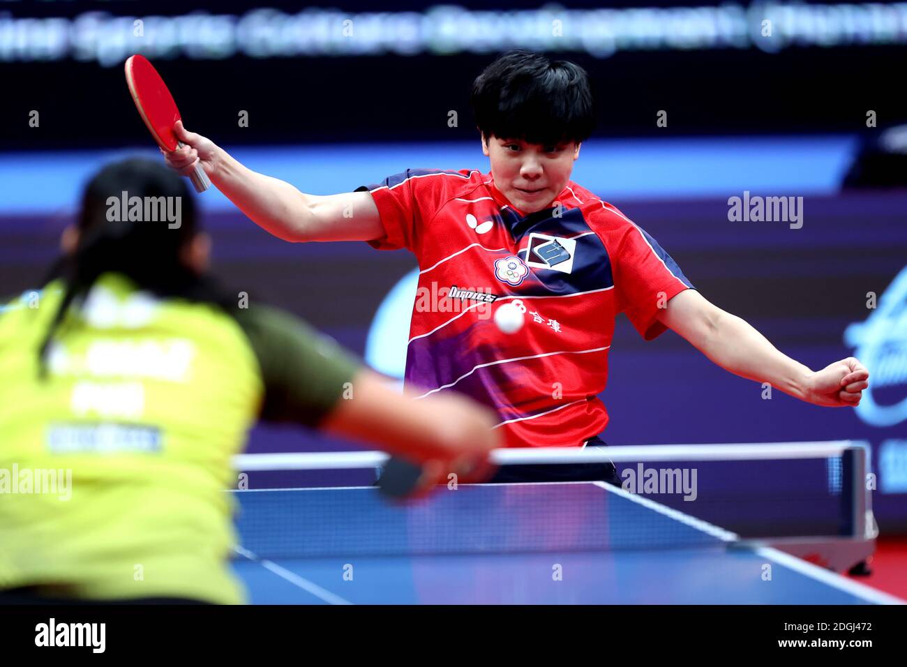 Taiwanese table tennis player Cheng Iching plays against Puerto Rican