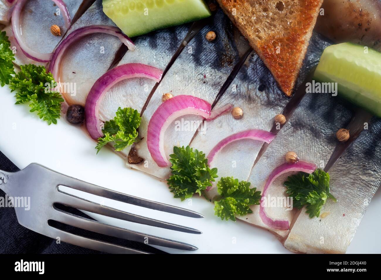 Salted mackerel with onions, bread and herbs Stock Photo Alamy