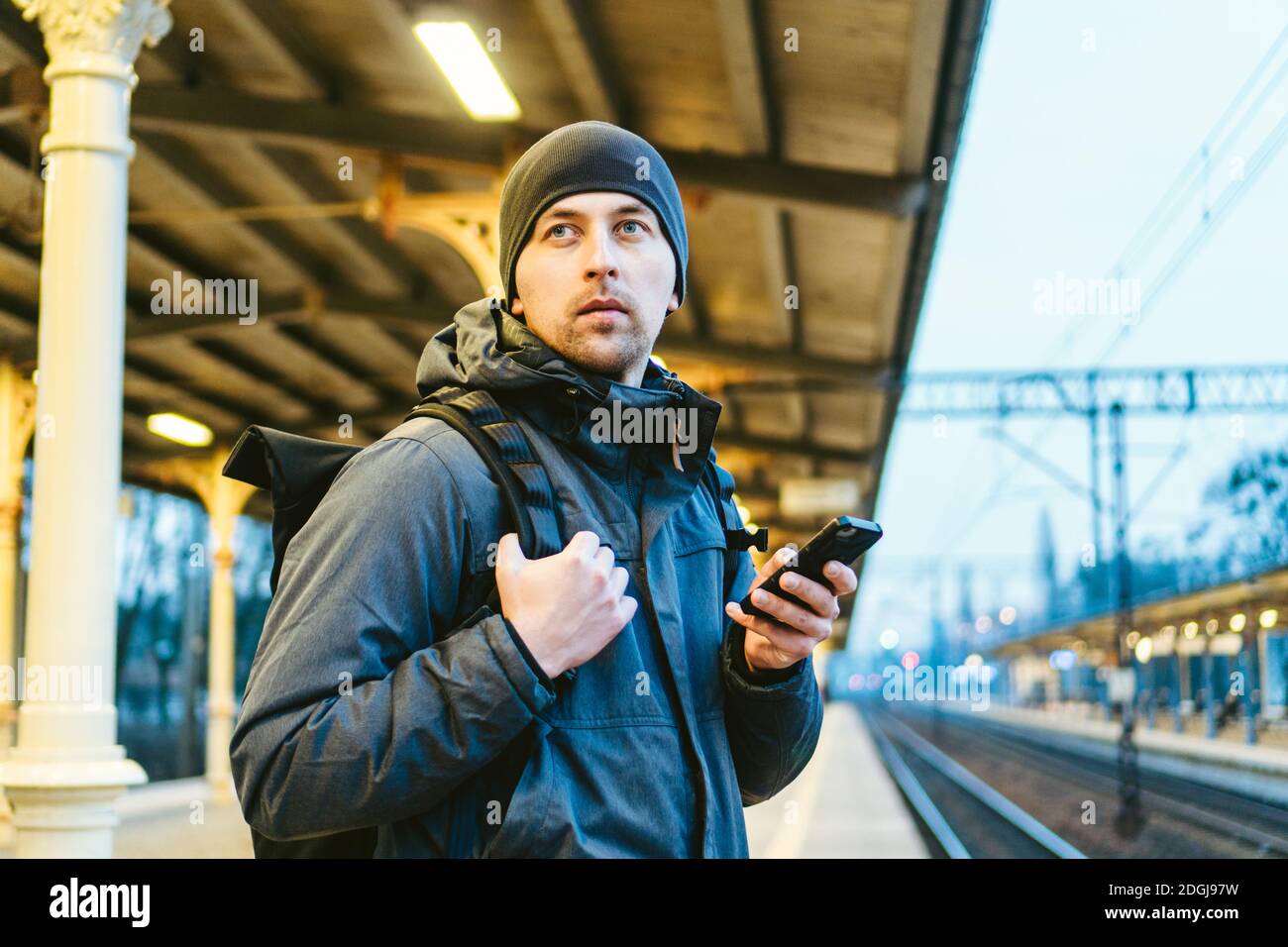 Sopot Railway station. traveler waiting for transportation. Travel concept. Man at the train station. Portrait Caucasian Male In Stock Photo