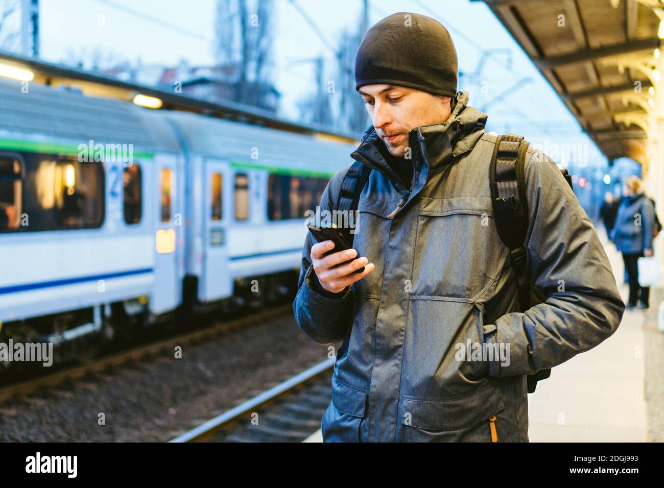 Sopot Railway station. traveler waiting for transportation. Travel concept. Man at the train station. Portrait Caucasian Male In Stock Photo