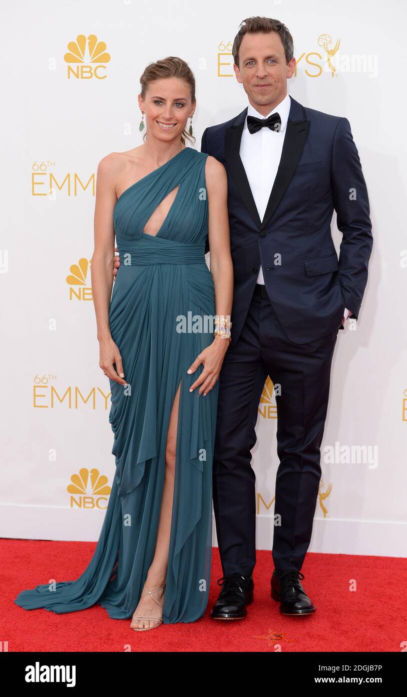 Seth meyers and wife alexi arriving at the emmy awards 2014 nokia live
