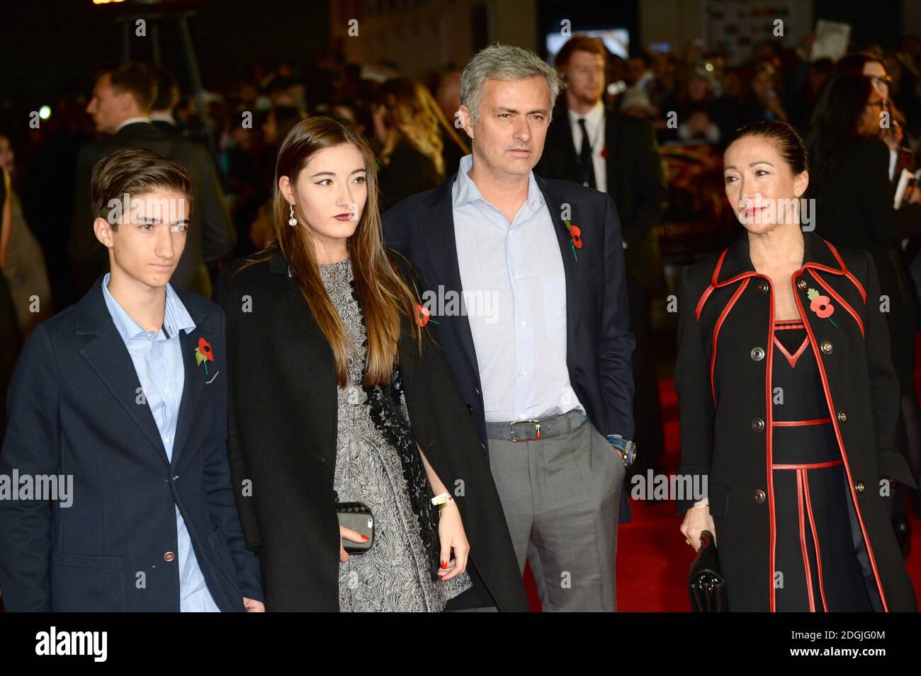 Jose Mourinho with wife Matilde Faria and children Matilde and Jose Mario, Jr. arriving at The Hunger Games: Mockingjay Part 1 World Premiere held at Odeon Leicester Square, London Stock Photo