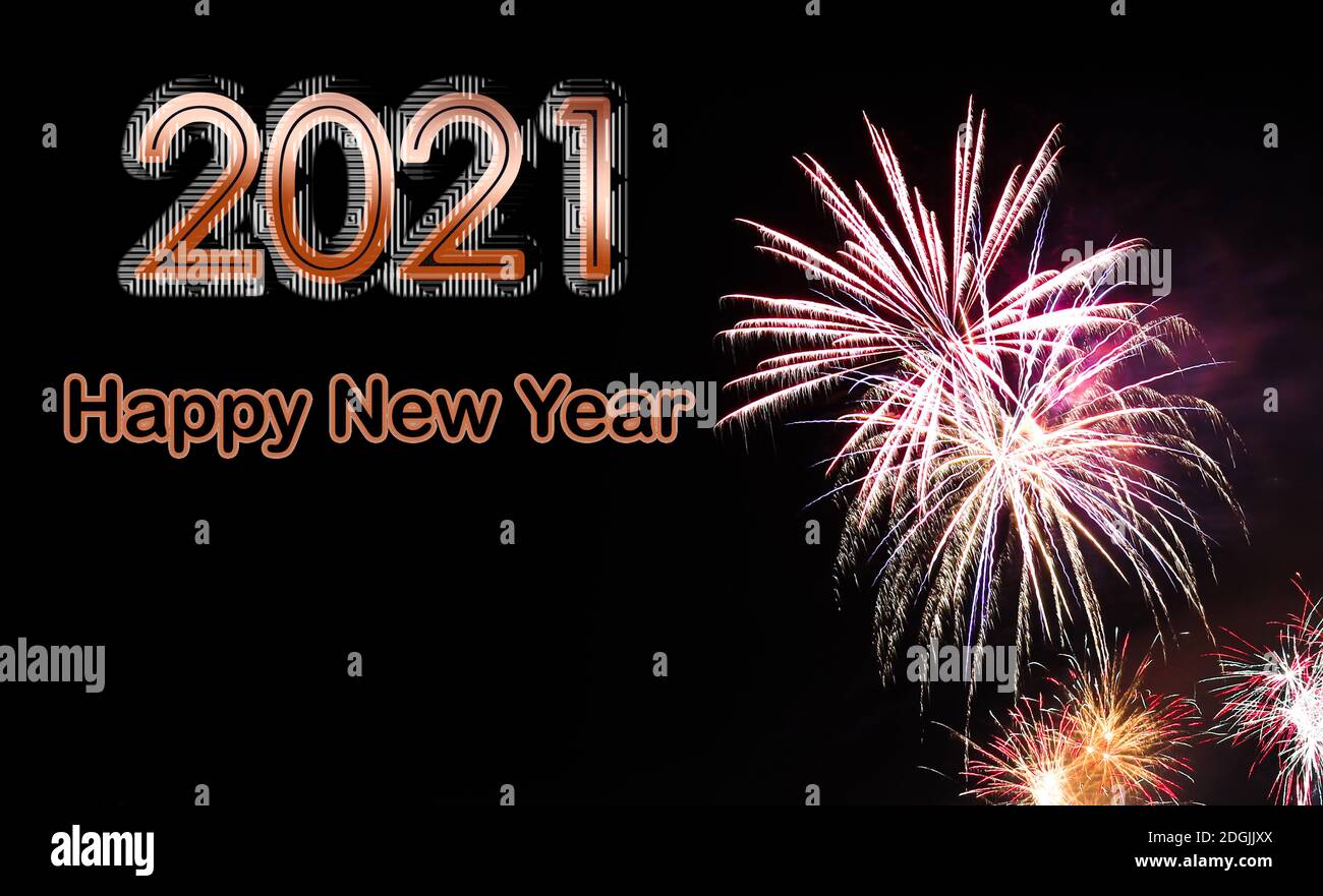 Happy New 2021 Year with text Dark Black background of fireworks Stock Photo