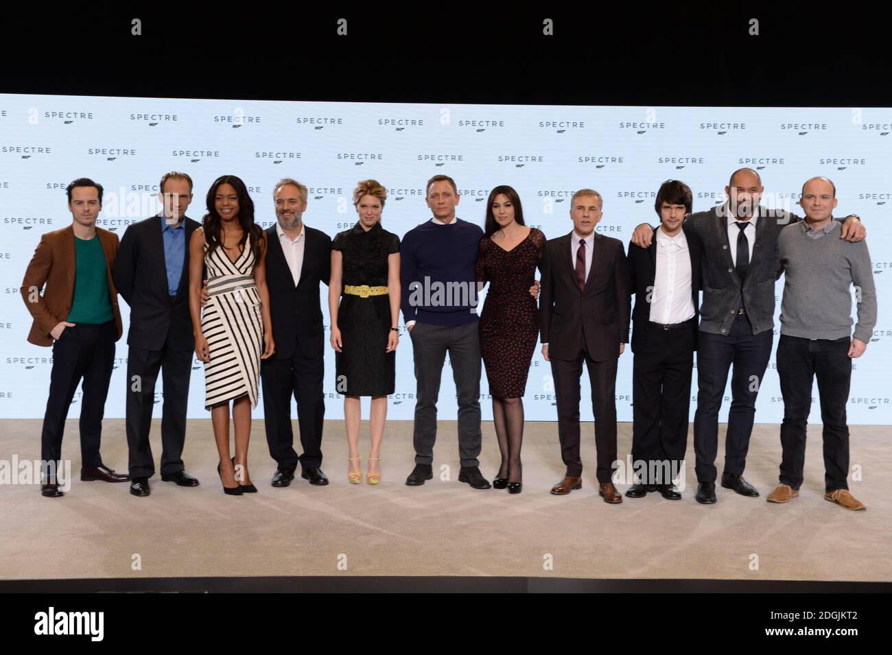 (L-R) Andrew Scott, Ralph Fiennes, Naomie Harris, Sam Mendes, Lea Seydoux, Daniel Craig, Monica Bellucci, Christoph Waltz, Ben Whishaw, Dave Bautista and Rory Kinnear attend the BOND 24 live announcement to mark the start of production on the 24th Bond film held at Pinewood Studios, London   The title and cast of the 24th Bond film were revealed, marking the start of principal photography on Monday 8th December Stock Photo