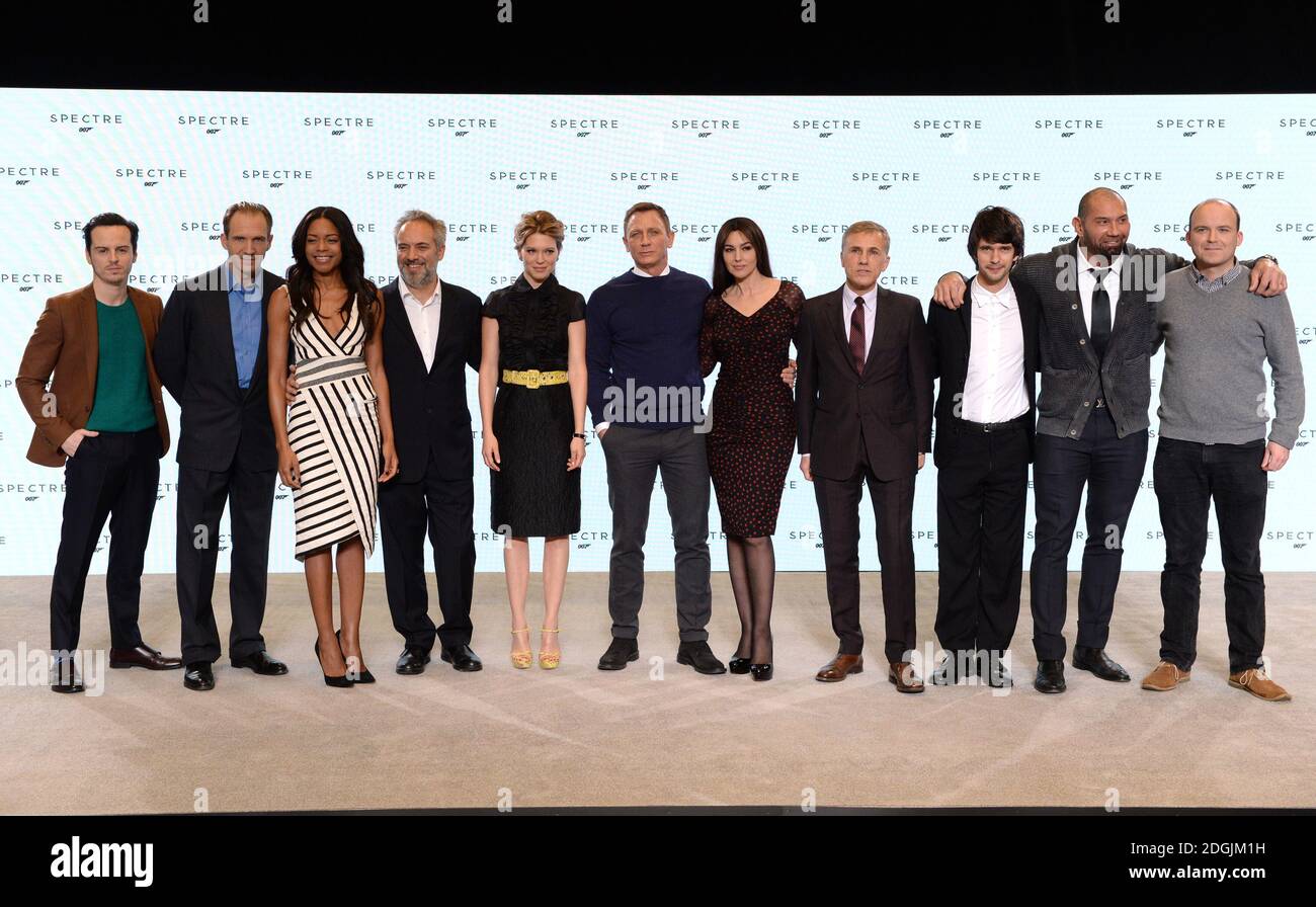 (L-R) Andrew Scott, Ralph Fiennes, Naomie Harris, Sam Mendes, Lea Seydoux, Daniel Craig, Monica Bellucci, Christoph Waltz, Ben Whishaw, Dave Bautista and Rory Kinnear attend the BOND 24 live announcement to mark the start of production on the 24th Bond film held at Pinewood Studios, London The title and cast of the 24th Bond film were revealed, marking the start of principal photography on Monday 8th December Stock Photo