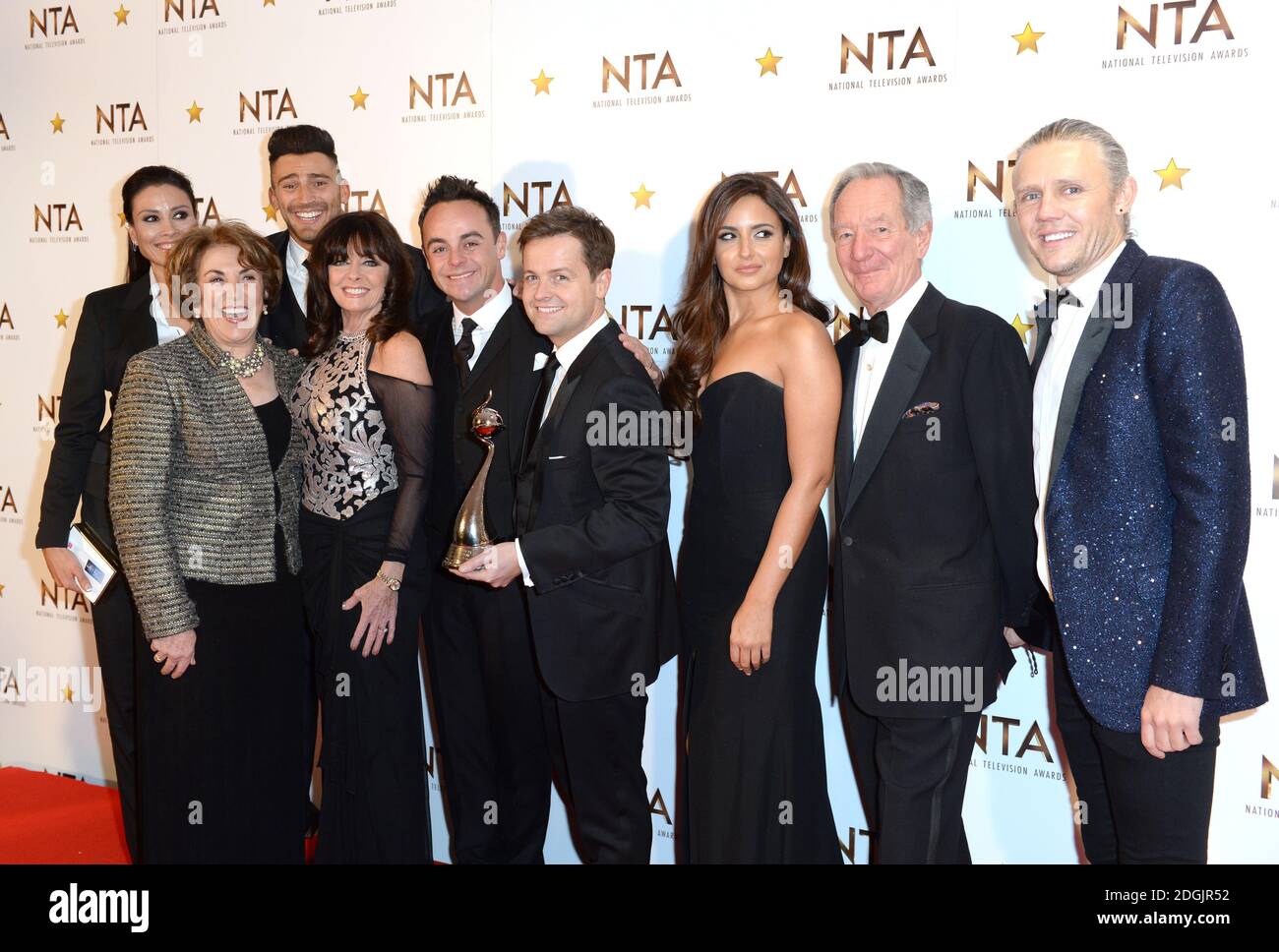 Ant and Dec (I'm A Celebrity) with Melanie Sykes, Edwina Currie, Jake Quickenden, Vikki Michelle, Nadia Forde, Michael Buerk and Jimmy Bullard with the award for Best Entertainment Programme in the press room at the National Television Awards 2015, held at the O2 Arena, London  This year the NTA's are celebrating their 20th year. Stock Photo