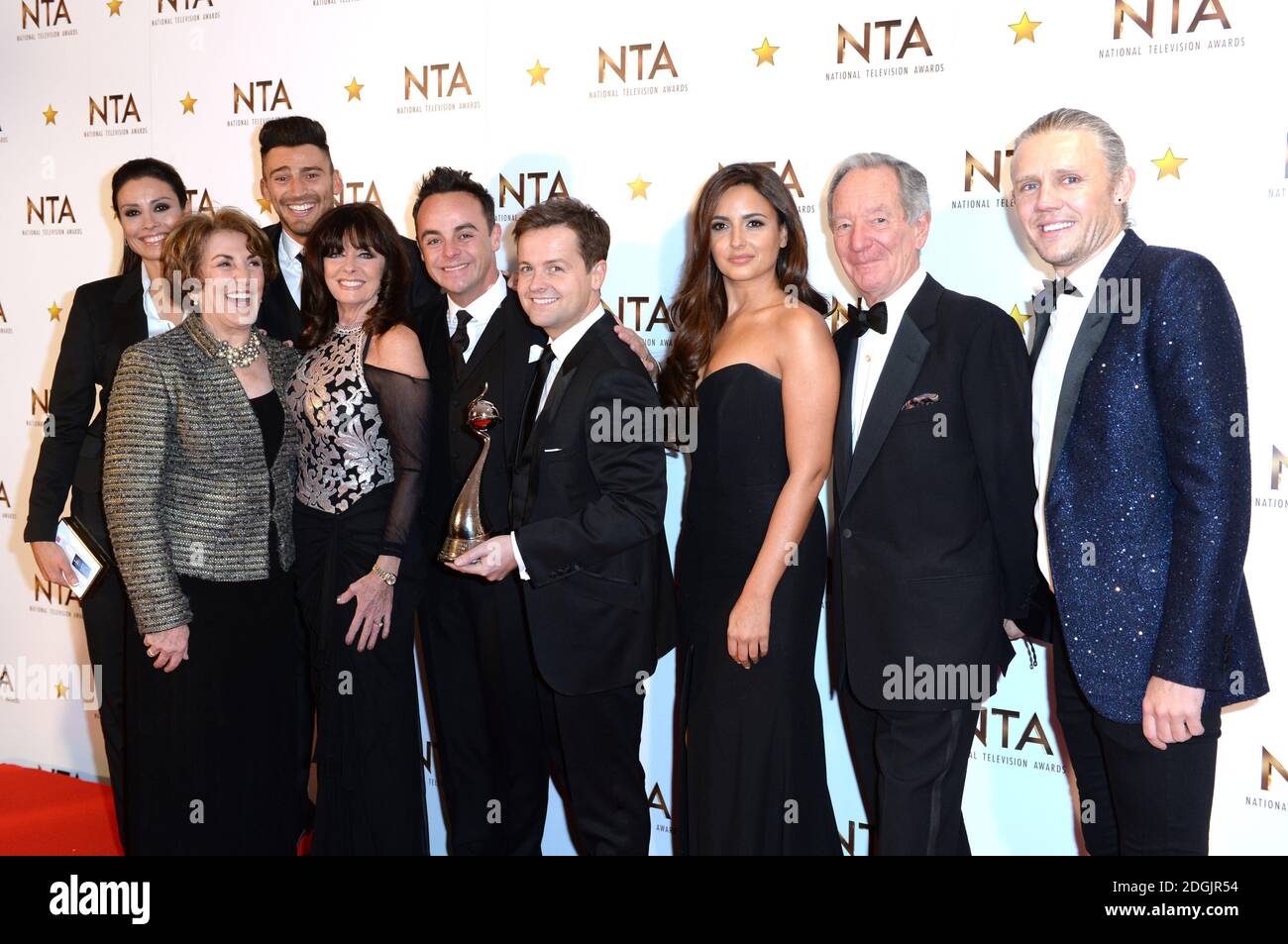Ant and Dec (I'm A Celebrity) with Melanie Sykes, Edwina Currie, Jake Quickenden, Vikki Michelle, Nadia Forde, Michael Buerk and Jimmy Bullard with the award for Best Entertainment Programme in the press room at the National Television Awards 2015, held at the O2 Arena, London  This year the NTA's are celebrating their 20th year. Stock Photo