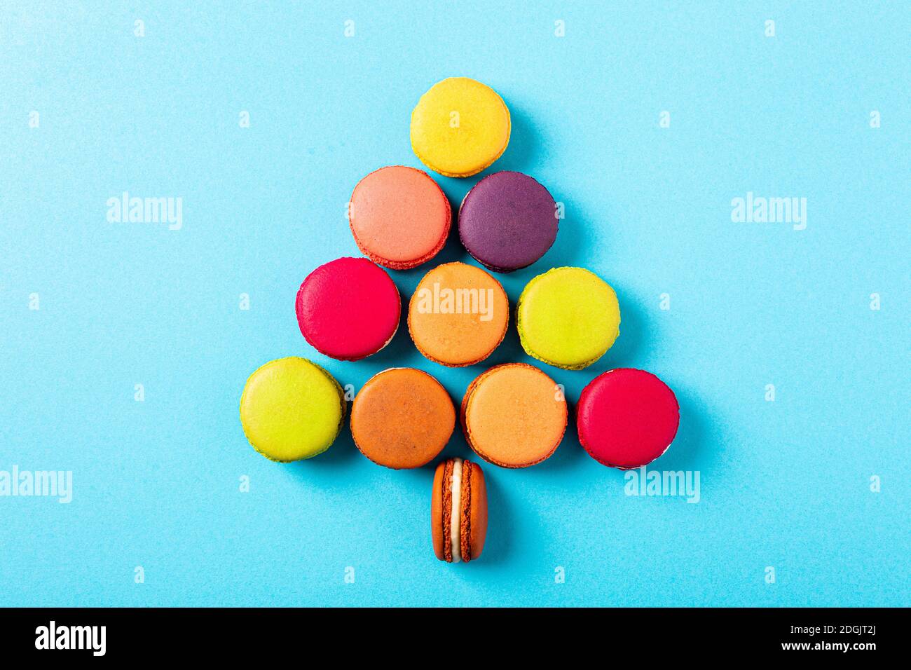 Christmas tree shape made of tasty macarons Stock Photo
