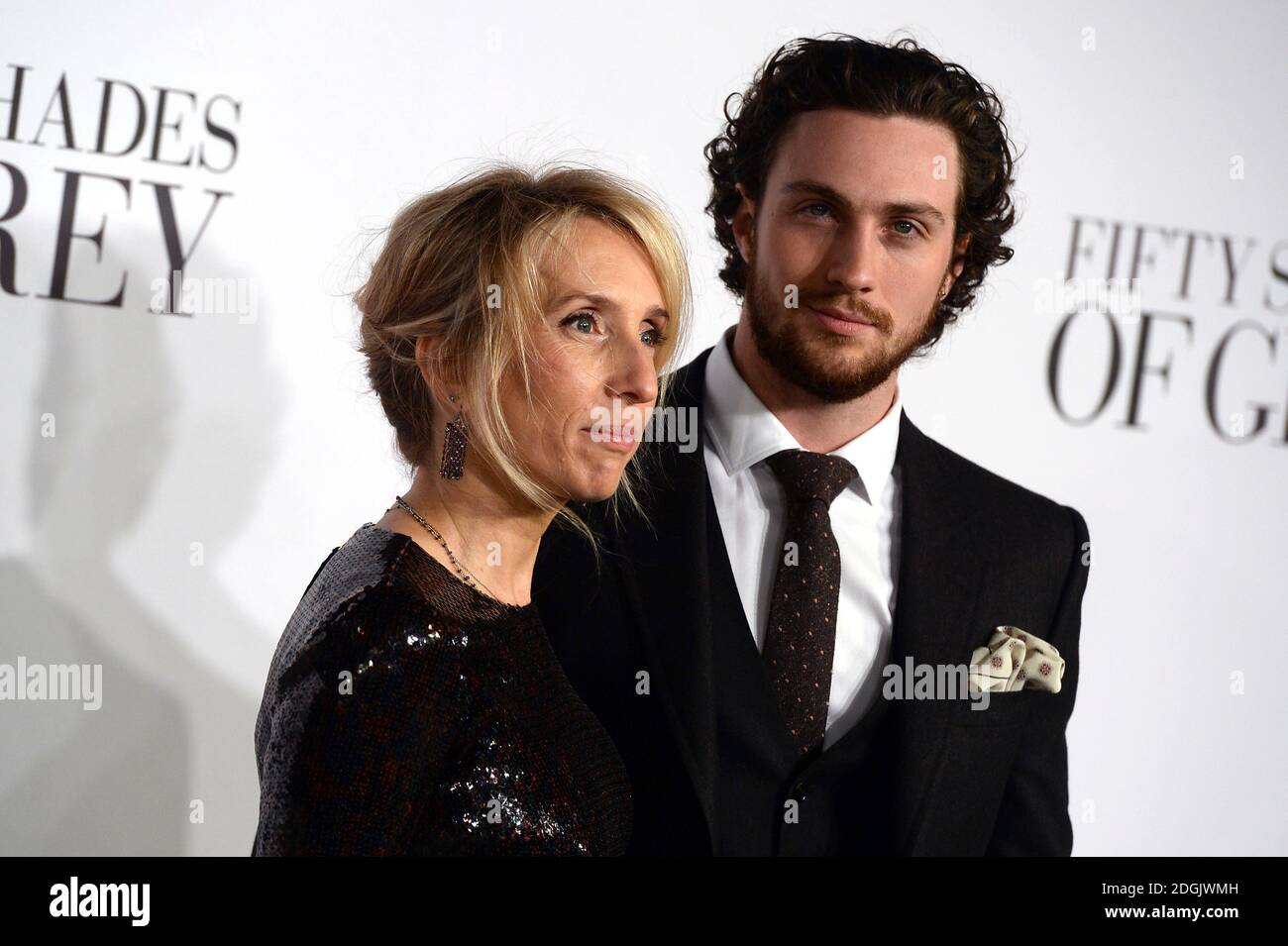 Sam Taylor-Johnson (left) and Aaron Taylor-Johnson (right) attending the UK film premiere of Fifty Shades Of Grey held at the Odeon cinema in Leicester Square, London Stock Photo
