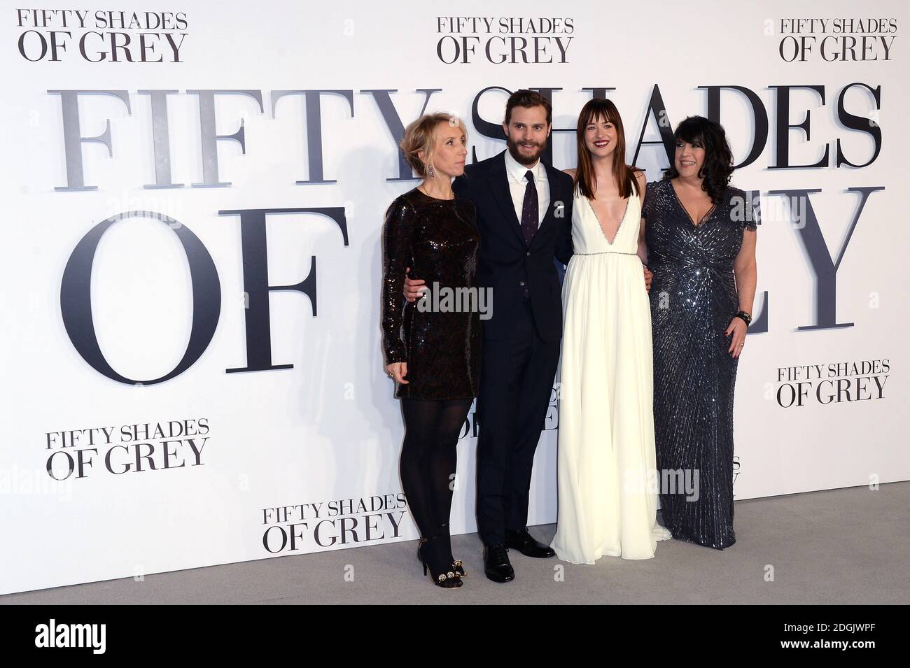 (left to right) Sam Taylor-Johnson, Jamie Dornan, Dakota Johnson and E L James attending the UK film premiere of Fifty Shades Of Grey held at the Odeon cinema in Leicester Square, London Stock Photo
