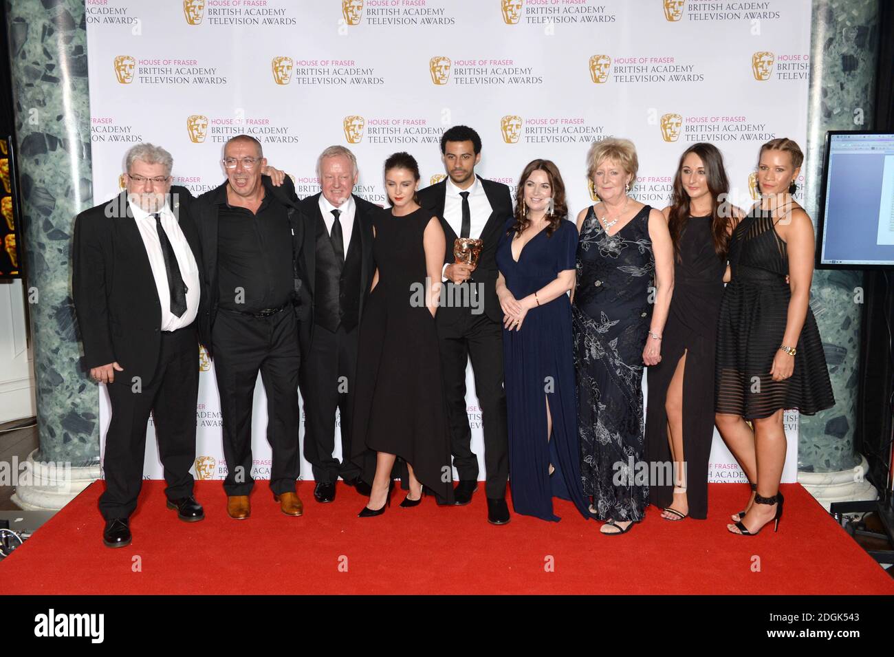 Stuart Blackburn with Les Dennis, Brooke Vincent and the Coronation Street Production Team with the BAFTA for Television Soap And Continuing Drama at the House of Fraser British Academy Television Awards held at the Theatre Royal, London  (Mandatory Credit: Doug Peters/EMPICS Entertainment) Stock Photo
