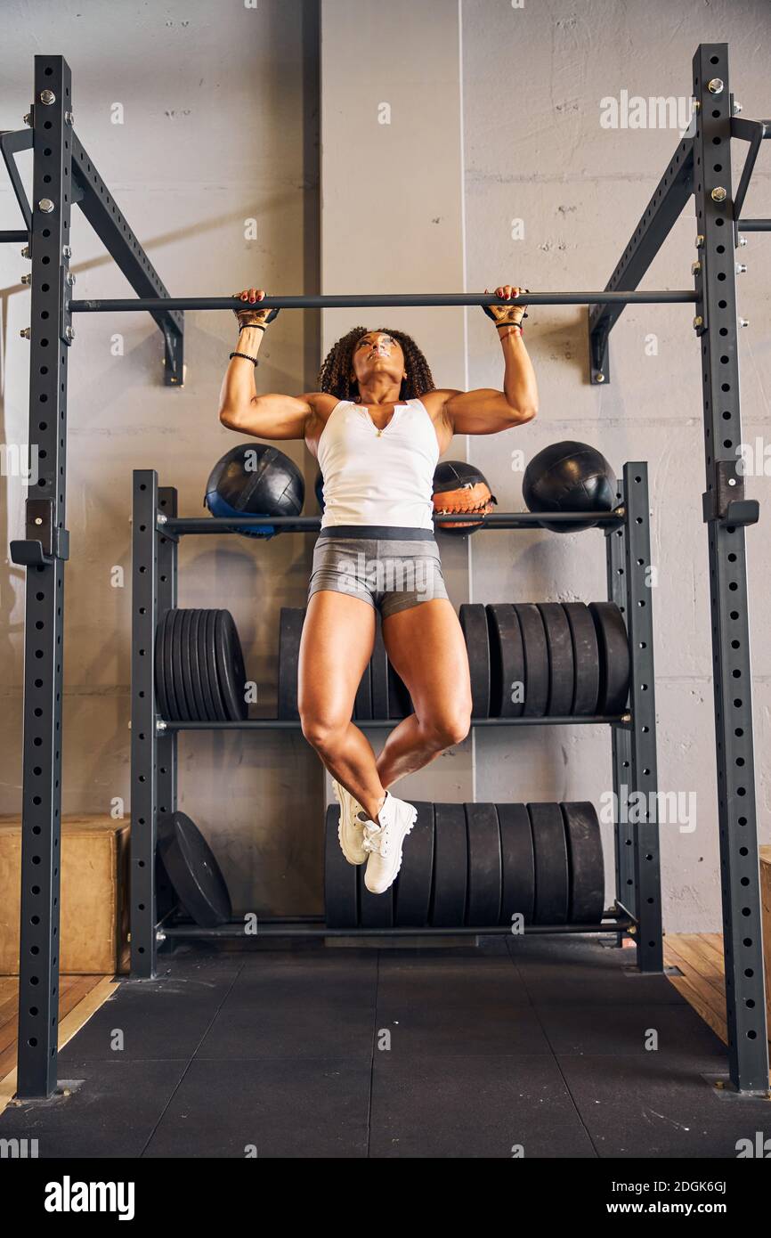 Practicing Strength Female gymnast practicing the strength training workout Stock Photo - Alamy