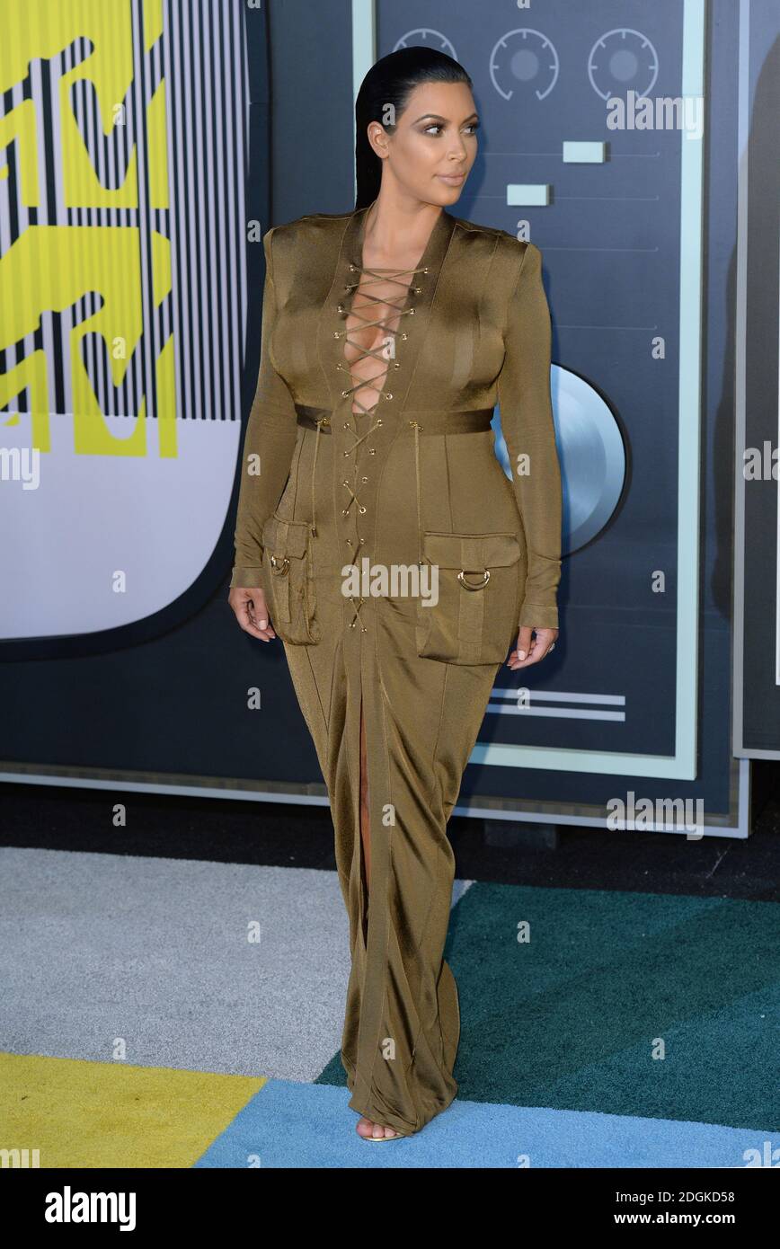 Full length bronze dress cleavage hi-res stock photography and images