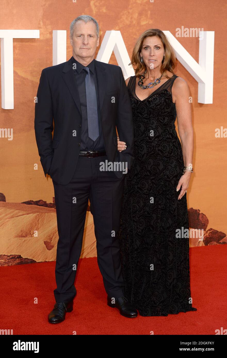 Jeff Daniels and wife Kathleen Rosemary Treado attending The Martian
