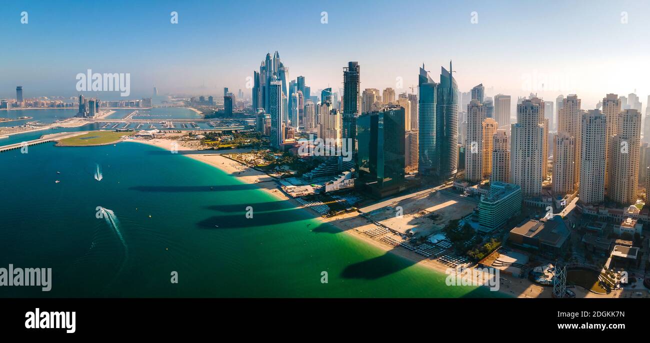 Panoramic aerial view of JBR beach and Dubai Marina skyscrapers and luxury buildings in one of the United Arab Emirates travel spots and resorts in Du Stock Photo