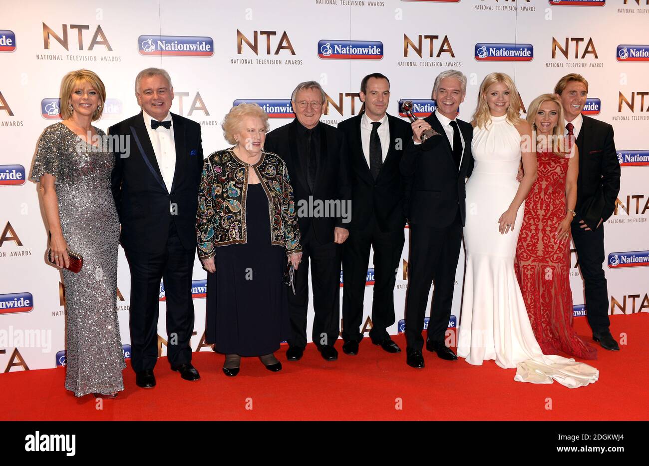 (Left to Right) Ruth Langsford, Eamonn Holmes, Denise Robertson, Dr Chris Steele, Martin Lewis, Phillip Schofield, Holly Willoughby, Eva Speakman and Nik Speakman from This Morning with the award for Best Magazine Show in the press room at the National Television Awards 2016 at the O2 Arena, London. Stock Photo