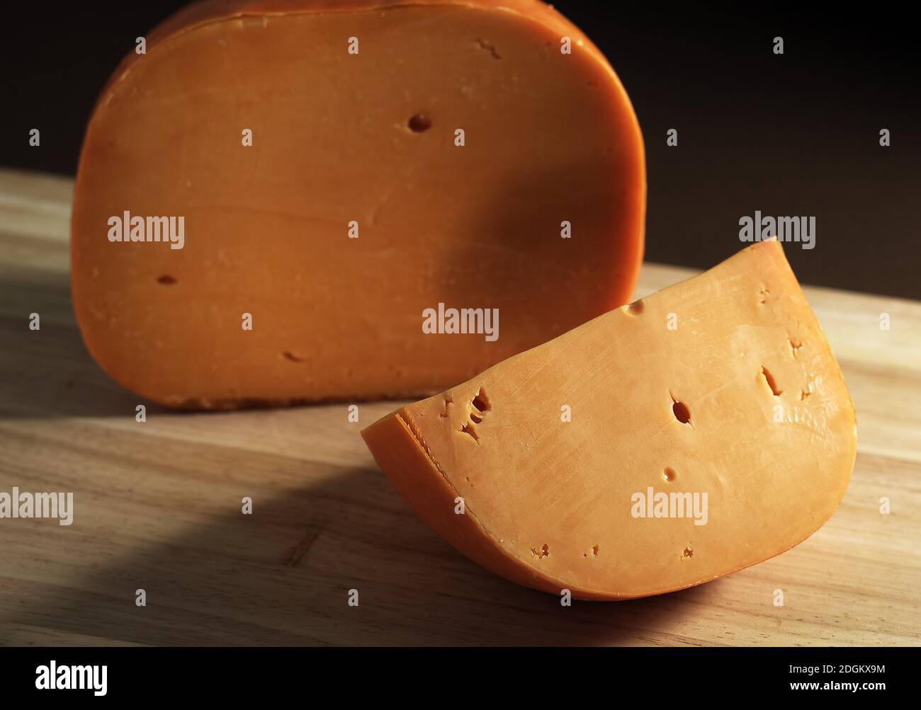 French Cheese called Mimolette, Cheese made from Cow's Milk Stock Photo