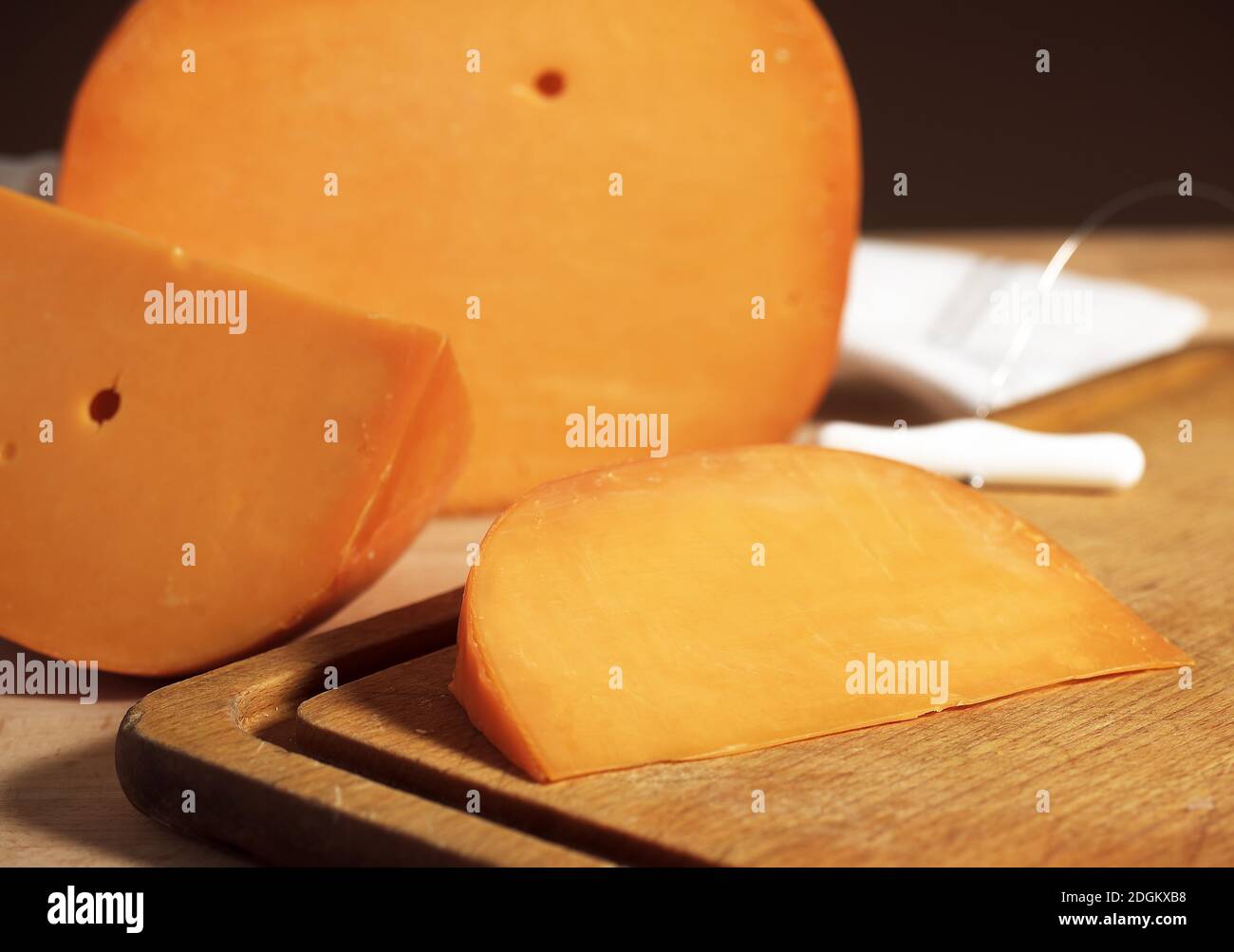 French Cheese called Mimolette, Cheese made from Cow's Milk Stock Photo