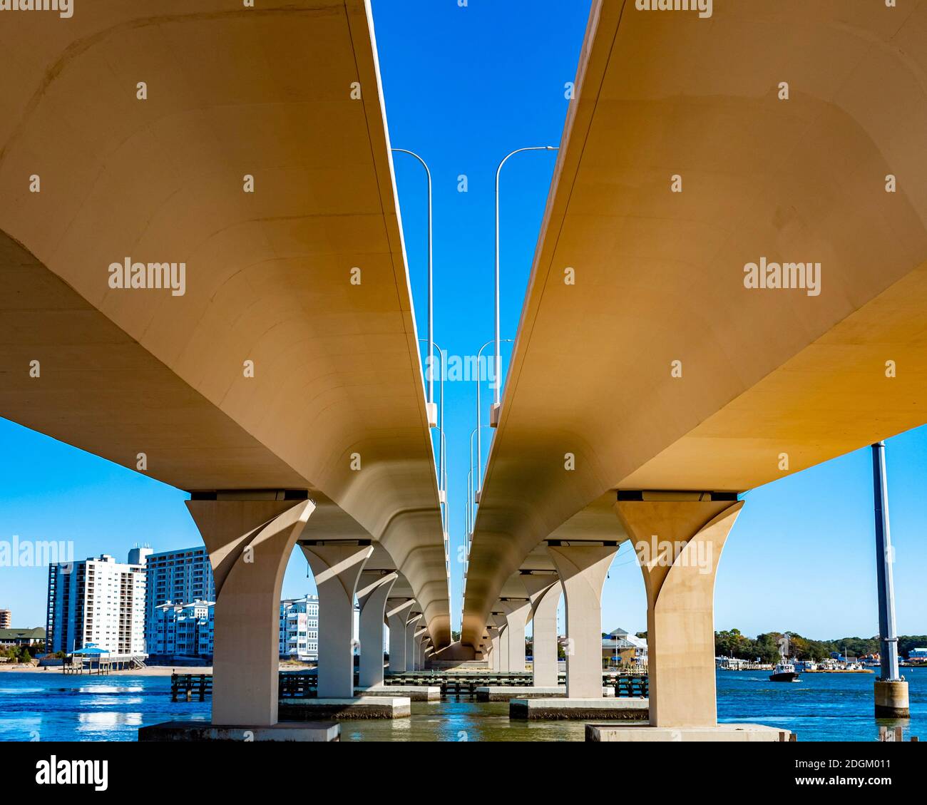 This is the underpass of a bridge that shows satisfying symmetry of lines. Stock Photo