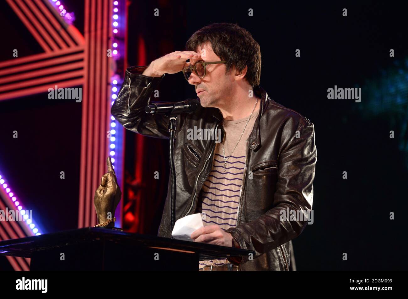 Graham Coxon collects the Best Music Film Award on stage during the NME Awards 2016 with Austin, Texas at the O2 Brixton Academy, London.  Stock Photo