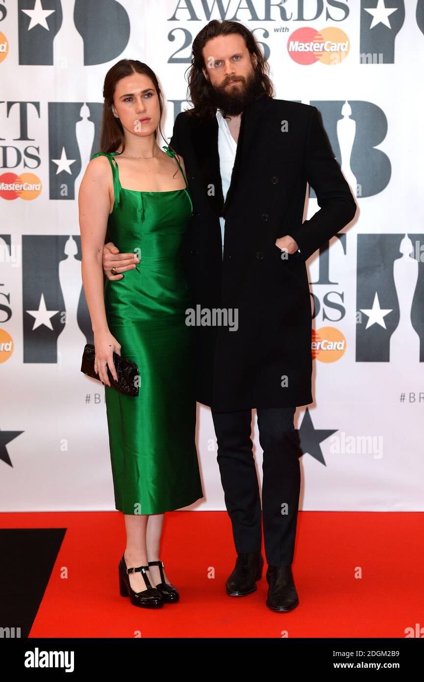 Father John Misty and guest arriving for the 2016 Brit Awards at the O2