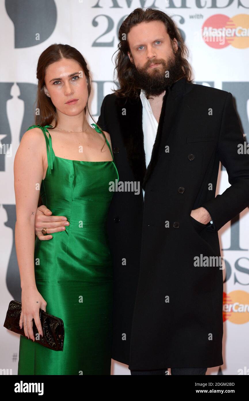 Father John Misty and guest arriving for the 2016 Brit Awards at the O2