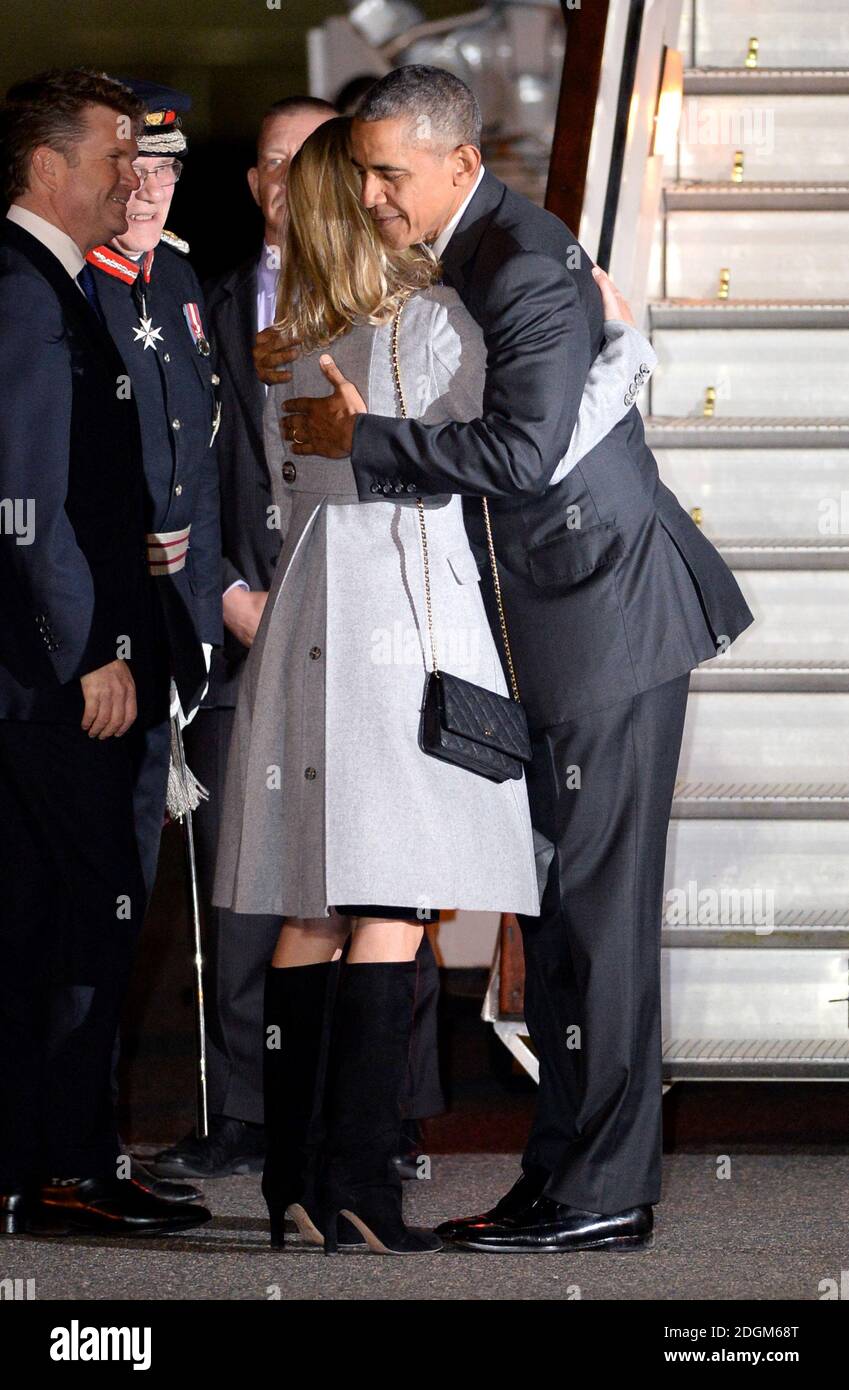 U.S. President Barack Obama arrives in the UK on Air Force One at London Stansted Airport, Essex and is greeted by Brooke Brown Barzun, wife of American Ambassador Matthew Barzun (left).  Stock Photo