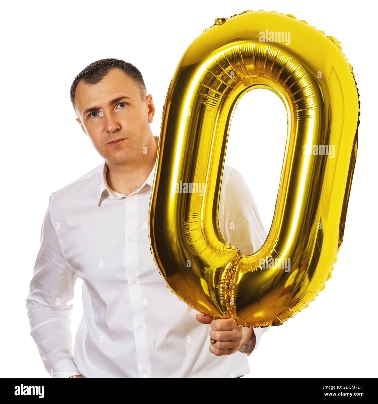 Man holds a ball in his hand in the form of zero, isolated on a white ...