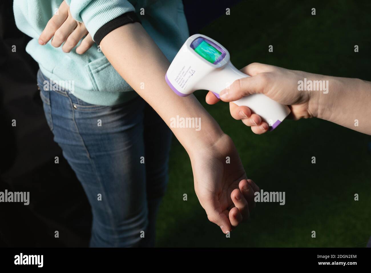 Gun electronic medical thermometer measuring Handheld Forehead Readings  diagnostic display shows the result of the body temperature measurement  36.6 C Stock Photo - Alamy