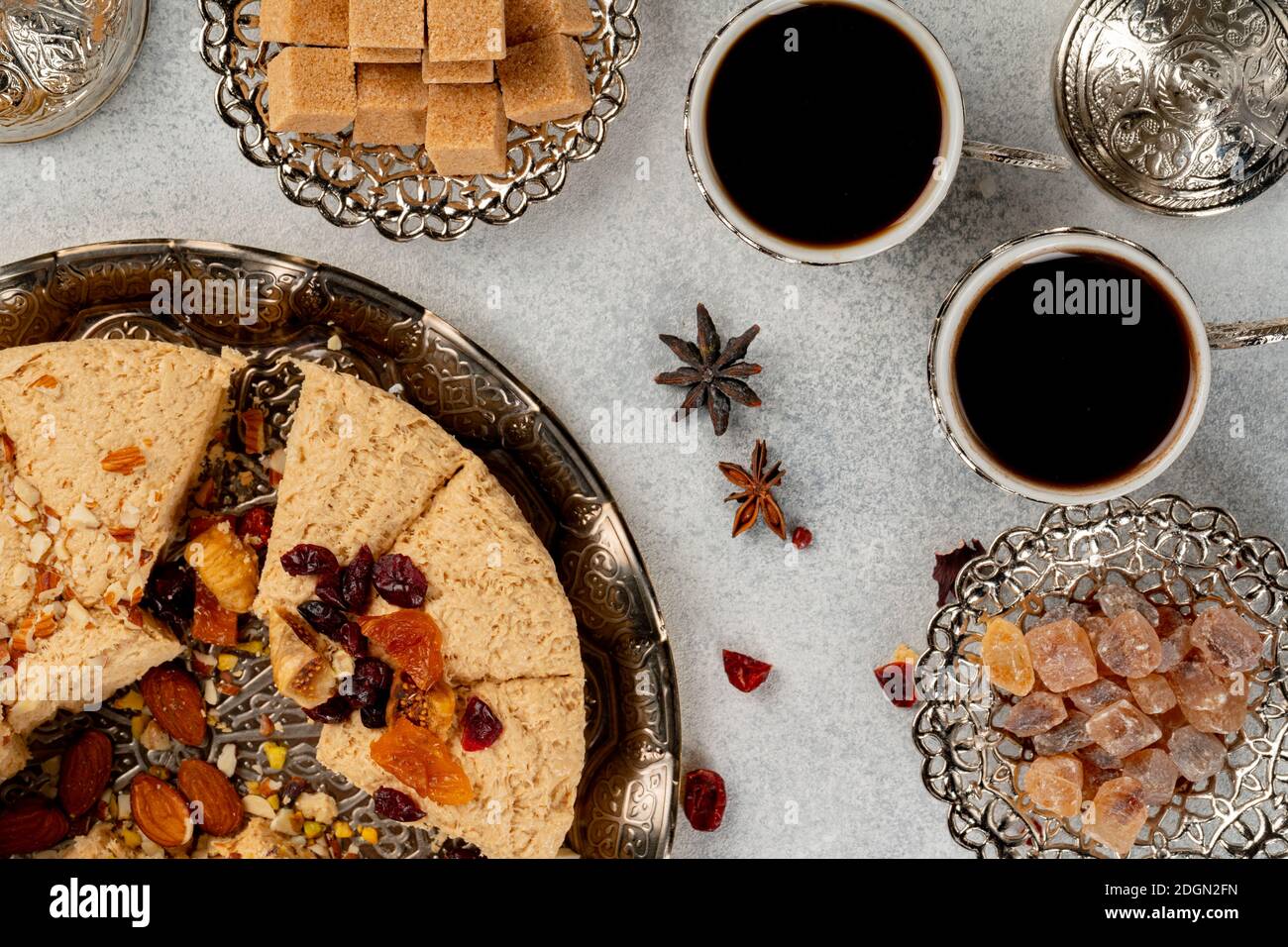 Halva with dried fruits on arabic dishware Stock Photo Alamy