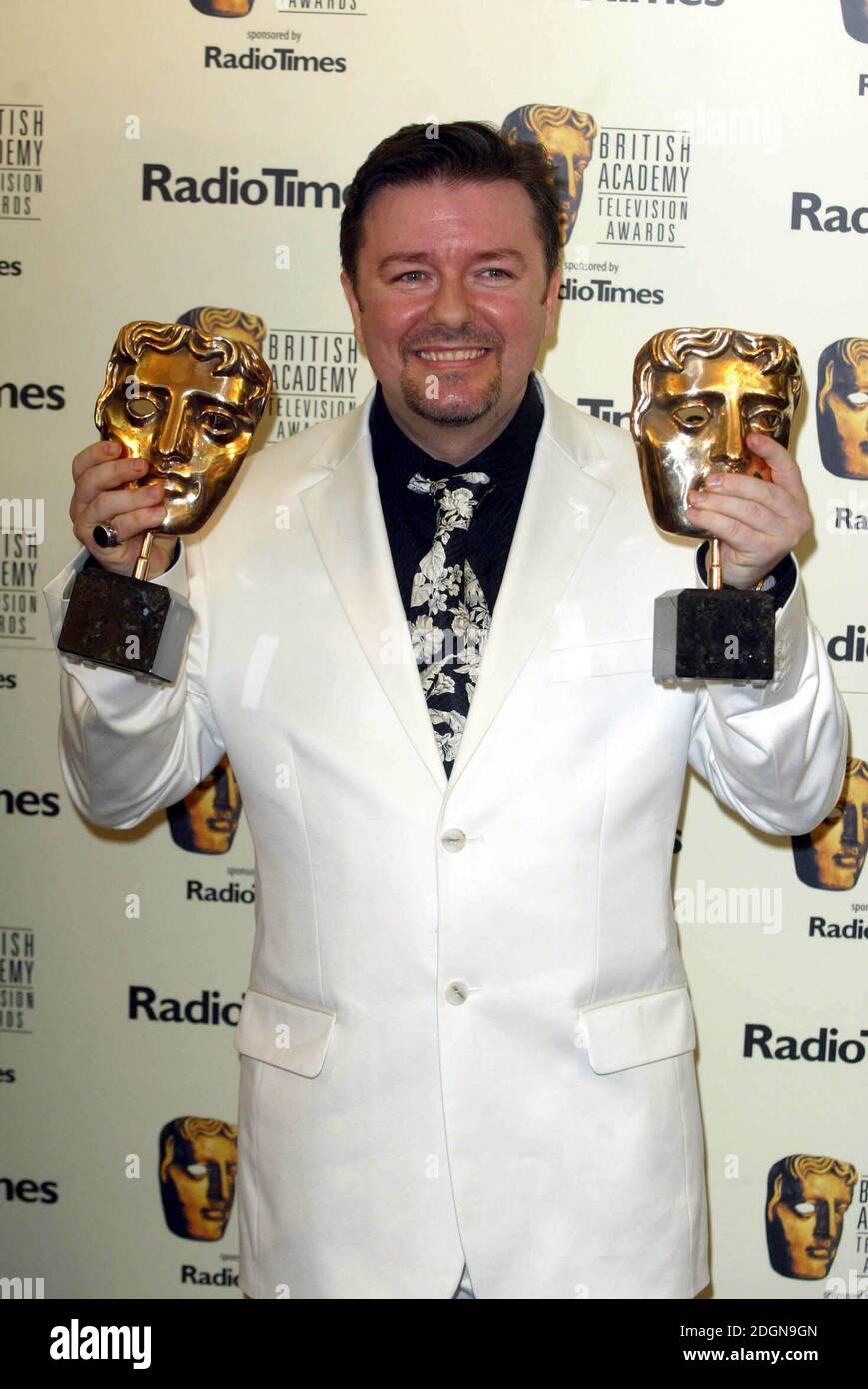 Ricky Gervais receives an award at the BAFTA Television Awards held at