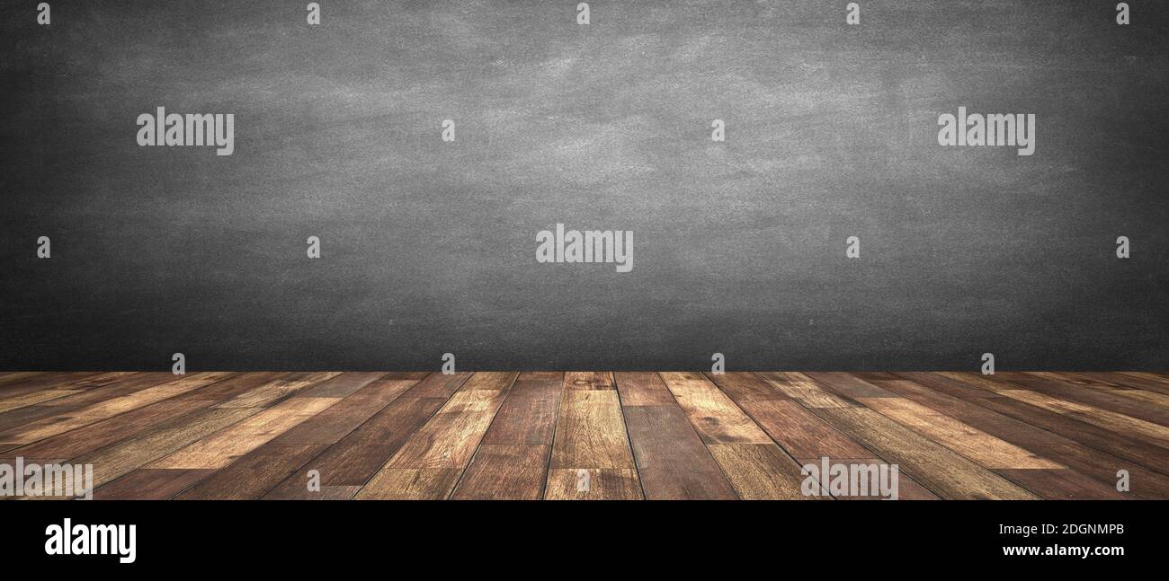 Rustic wooden table with grey background Stock Photo - Alamy