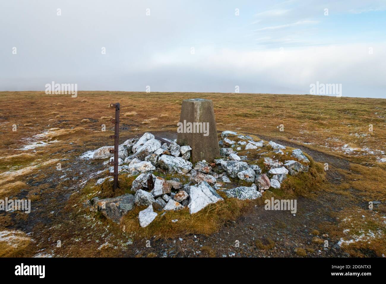 The summit trig point of the Munro mountain of A Bhuideanach Bheag in