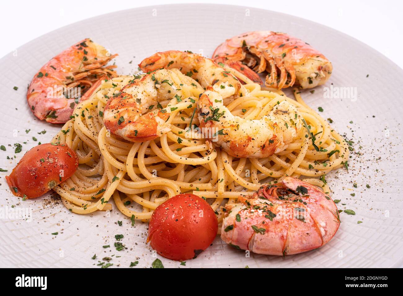 a plate with spaghetti and prawns Stock Photo