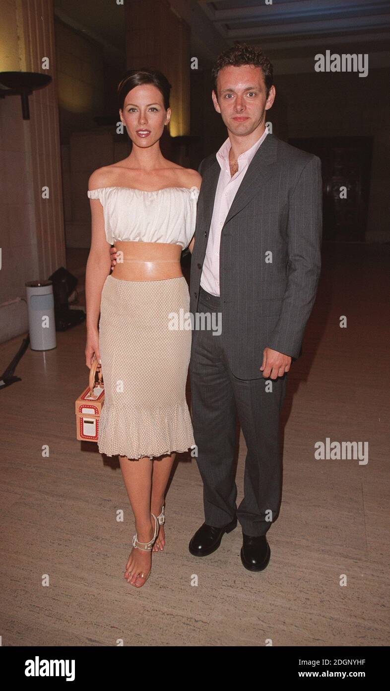 Kate Beckinsale with her husband at the London film premiere of Pearl Harbour. Full Length. box handbag.   Stock Photo