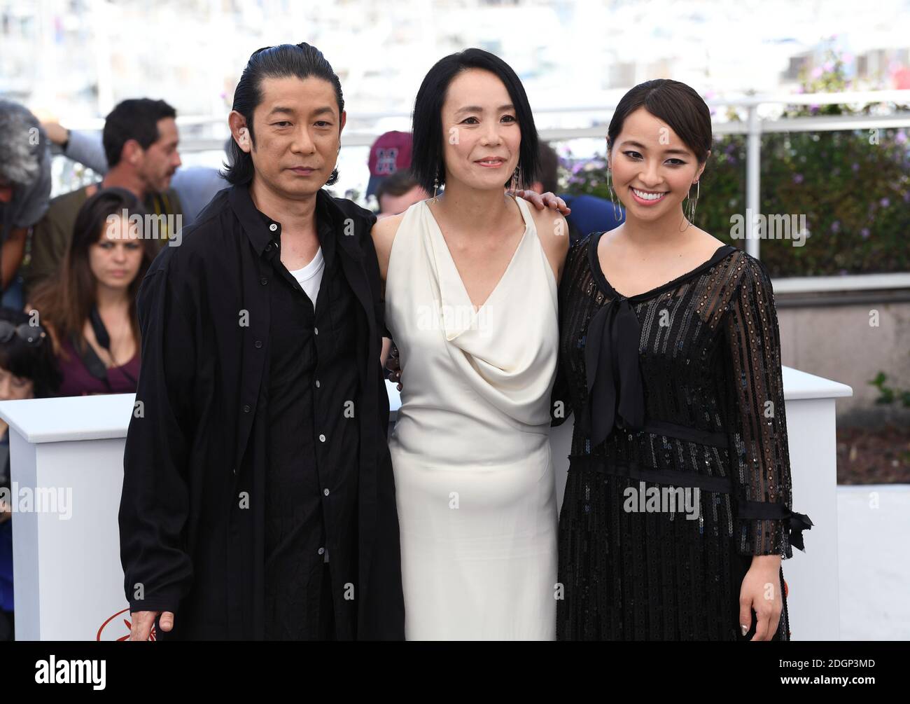 Masatoshi Nagase, Naomi Kawase and Ayame Misaki attending the Radiance photocall as part of the 70th Cannes Film Festival Stock Photo