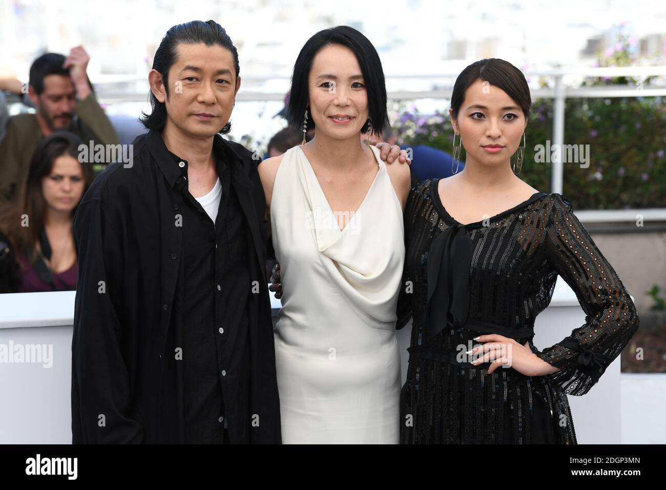 Masatoshi Nagase, Naomi Kawase and Ayame Misaki attending the Radiance photocall as part of the 70th Cannes Film Festival Stock Photo