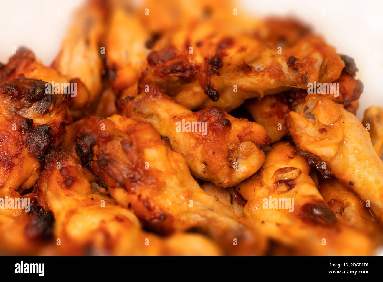 Delicious juicy fried buffalo chicken wings. Stock Photo