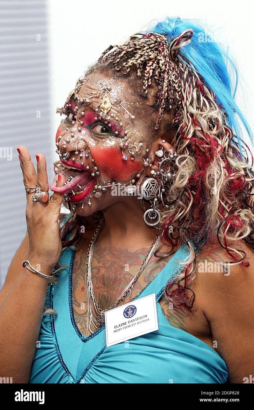 Elaine Johnson, most pierced woman with 1009 piercings celebrating the 100 Millionth copy of The Guiness Book of World Records, Tate Modern, London. Â©Doug Peters/allactiondigital.com  Stock Photo