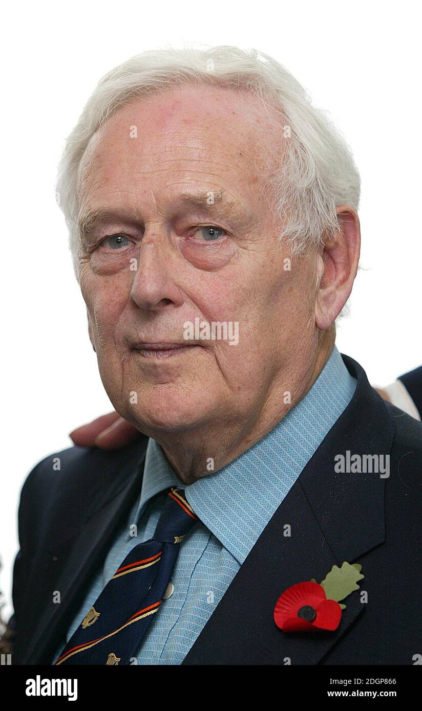 Norris McWhirter celebrating the 100 Millionth copy of The Guiness Book