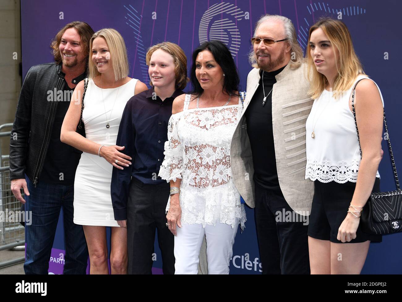 Left to right, Ashley Gibb, Therese Gibb, Lucas Gibb, Linda Gibb, Barry Gibb and Alexandra Gibb arriving for the Nordoff Robbins O2 Silver Clef Awards held at the Grosvenor House Hotel in London, Friday June 30, 2017 Stock Photo